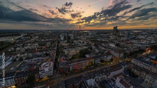 D  sseldorf city Germany nightscape with dramatic sky and rhine Rhein tower in the back at sunset