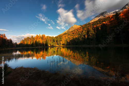 Lej Nair in engadine valley in an autumn landscape photo
