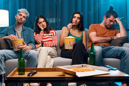 Bilde på lerret Friends watching a boring movie together