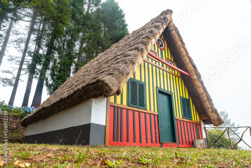 Traditional Madeiran house like those of Santana in the forest of Caldeirao Verde, Santana photo