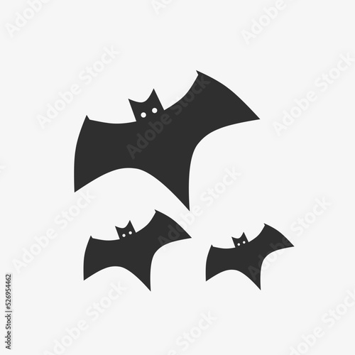 flat illustration of three black bats isolated on a white background suitable for halloween elements