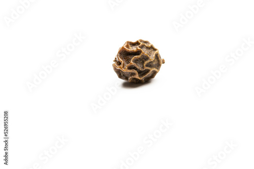 black pepper, peppercorn isolated on white background. macro photo. front view 