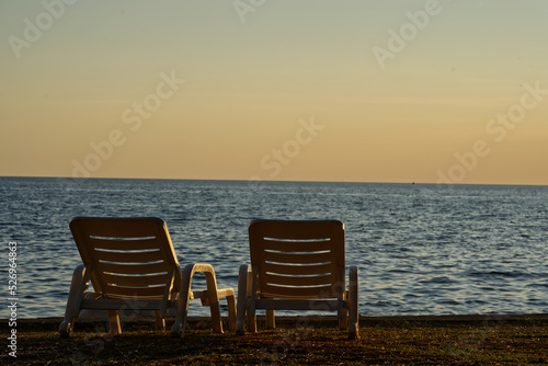 Empty sun loungers with ocean view © Patrick