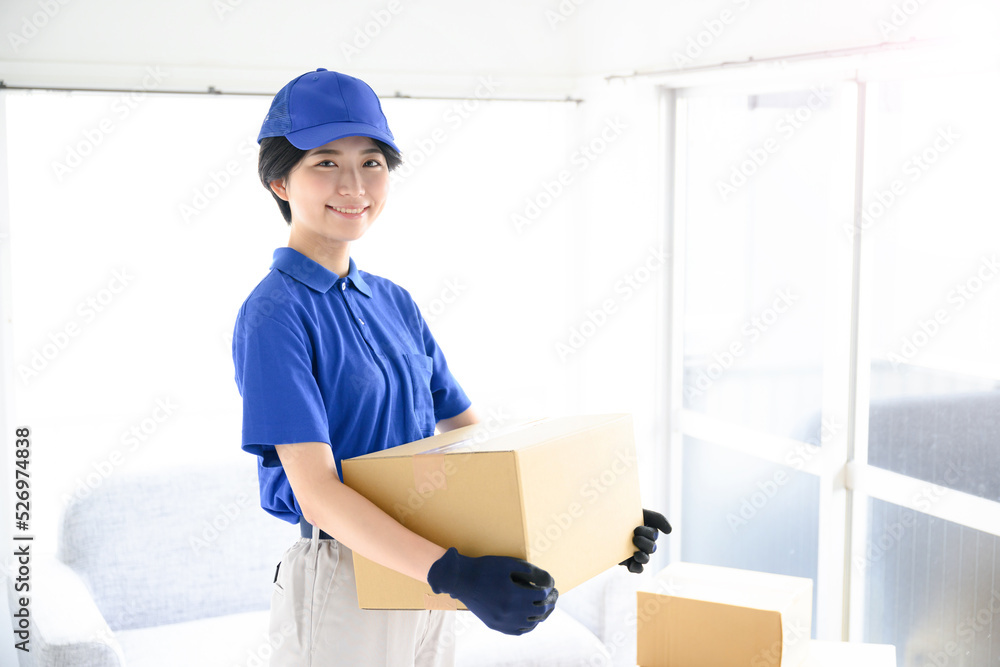 Image of a moving worker with a nice smile Image of a moving worker with a nice smile