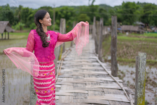 Beautiful Asian woman in traditional dress culture Thai costume of Tai people minority ethnic dress for holy days at Mae Hong Son, Northern Thailand. photo