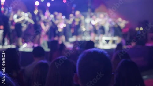 Wallpaper Mural Audience dancing under colorful illumination Torontodigital.ca