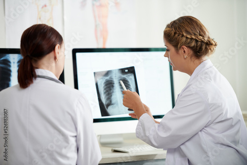 Medical Workers Analyzing X-ray