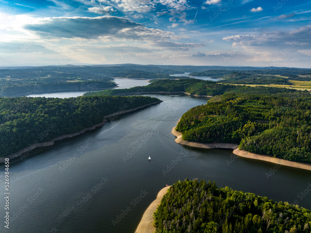 Fototapeta premium Czechia, Vltava River Aerial View. Czech Republic. Beautiful Summer Green Landscape with Orlík Water Reservoir and Boats. View from Above. 