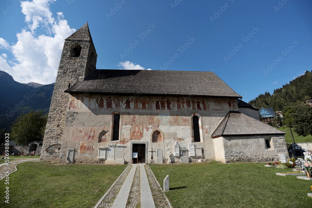 The church of San Virgilio in Pinzolo, Trentino, Italy, is a medieval cemetery church with the fresco depicting the Macabre Dance on the external facade.