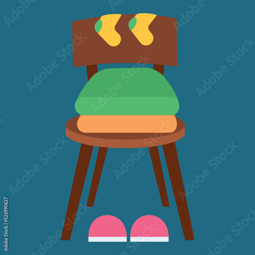 neatly folded clothes on a chair