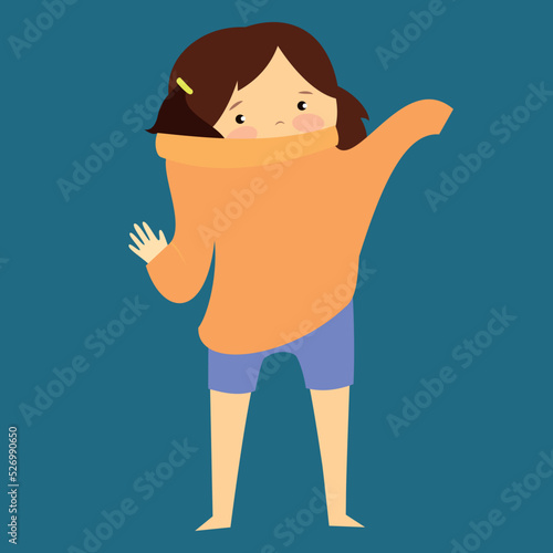 girl putting on a sweater