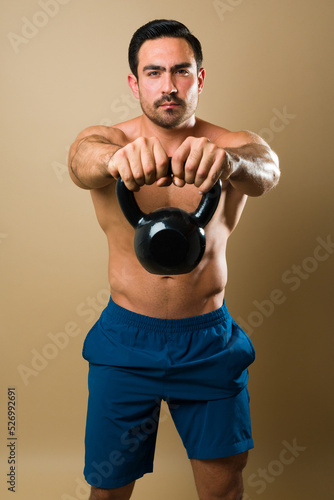 Attractive muscular exercising with cross training and weightlifting © AntonioDiaz