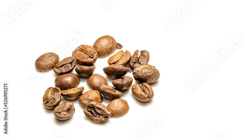 heap of Roasted coffee beans isolated on white background. macro photo