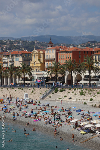 View of the Promenade des Anglais and the beaches of Nice at the height of the tourist season in August © Andrei Antipov