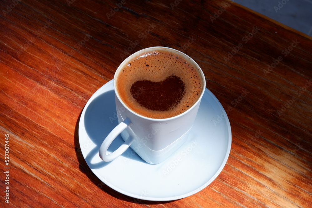 Obraz premium foamy turkish coffee , turkish coffee in the cup . view from above.