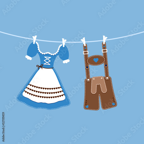 Hängendes Dirndl & Lederhose Blau Braun Blauer Hintergrund