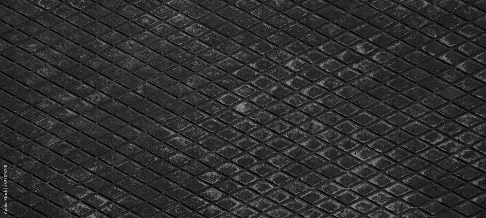 Black gray grey dark grunge background texture - Concrete cement metal plate or tile with a diamond shape pattern Black gray grey dark grunge background texture - Concrete cement metal plate or tile with a diamond shape pattern