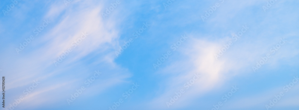Obraz premium Abstract blue sky white cloud on the light of the sun background with empty copy space for add text or advertise design creative