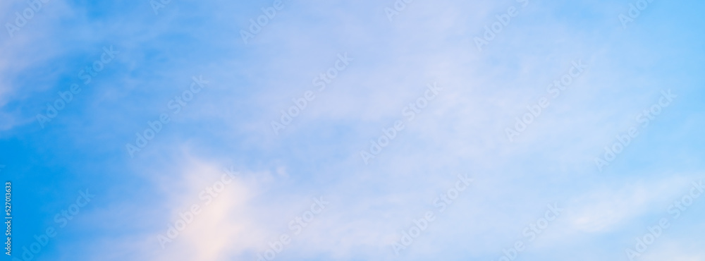 Obraz premium Abstract blue sky white cloud on the light of the sun background with empty copy space for add text or advertise design creative