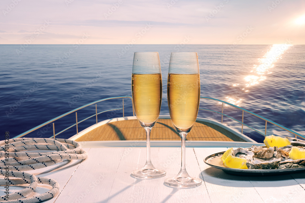 Exotic country voyage. Champagne flutes glasses on deck of luxury