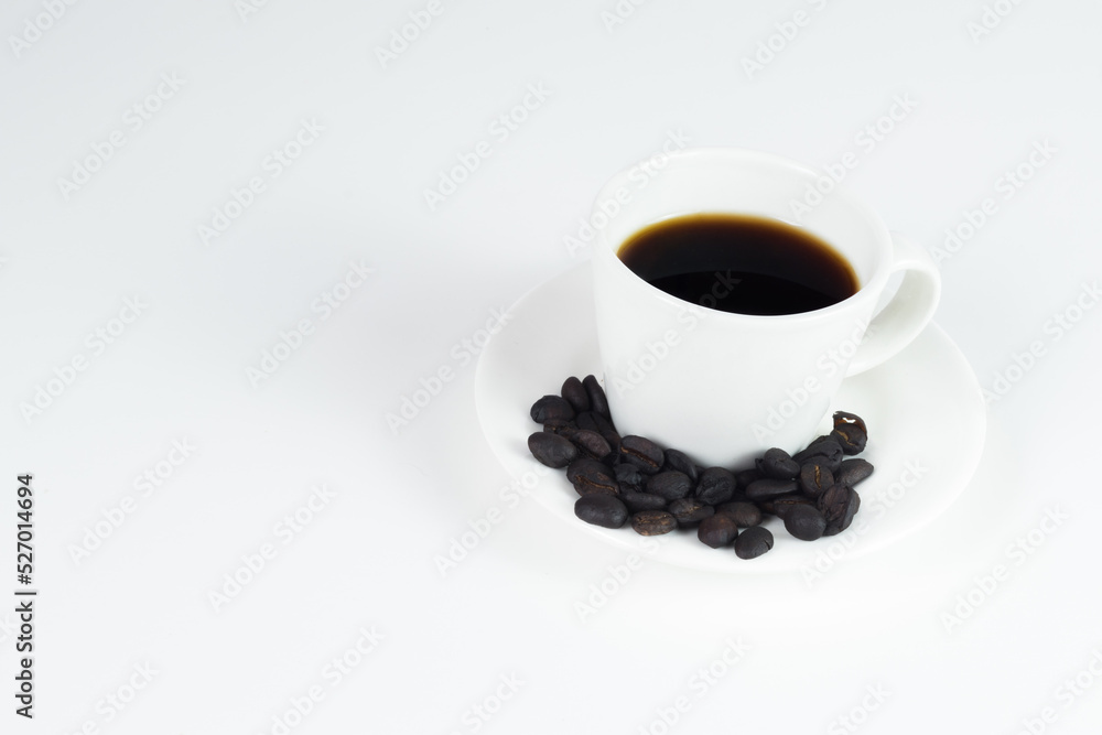 international coffee day, traditional colombian drink, closeup of a mug of coffee with a white background and roasted coffee with copy space international coffee day, traditional colombian drink, closeup of a mug of coffee with a white background and roasted coffee with copy space