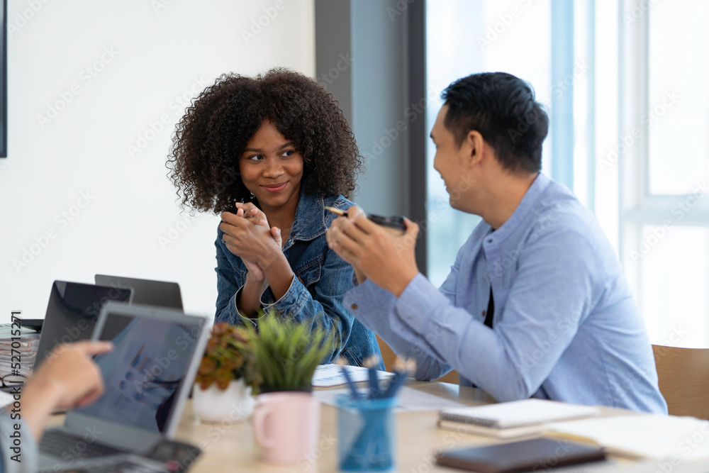 African American office woman Discussing with colleagues in the office African American office woman Discussing with colleagues in the office