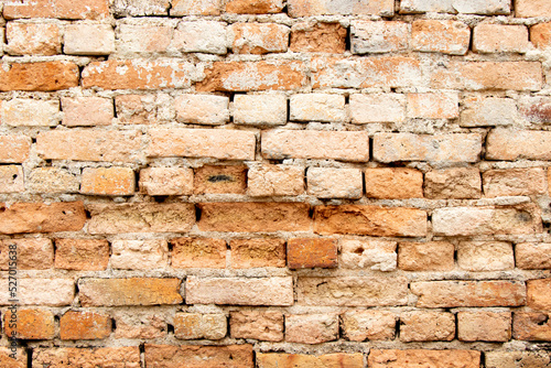 Grunge old and crack red color brick pattern wall textured background.