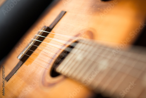 detail of classic guitar with shallow depth of field photo