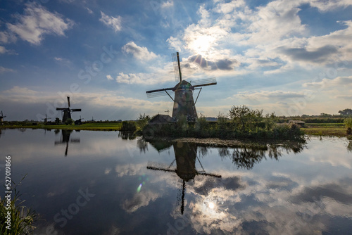 Horizontal picture of two of the famous Dutch windmills at Kinderdijk, a UNESCO world heritage site. On the photo are two mill of the 19 windmills at Kinderdijk, South Holland, the Netherlands, which