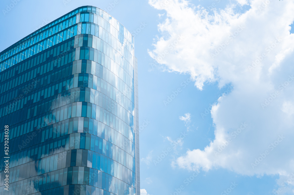 Glass wall architecture building reflection cloud and sky background.concept for modern office Glass wall architecture building reflection cloud and sky background.concept for modern office