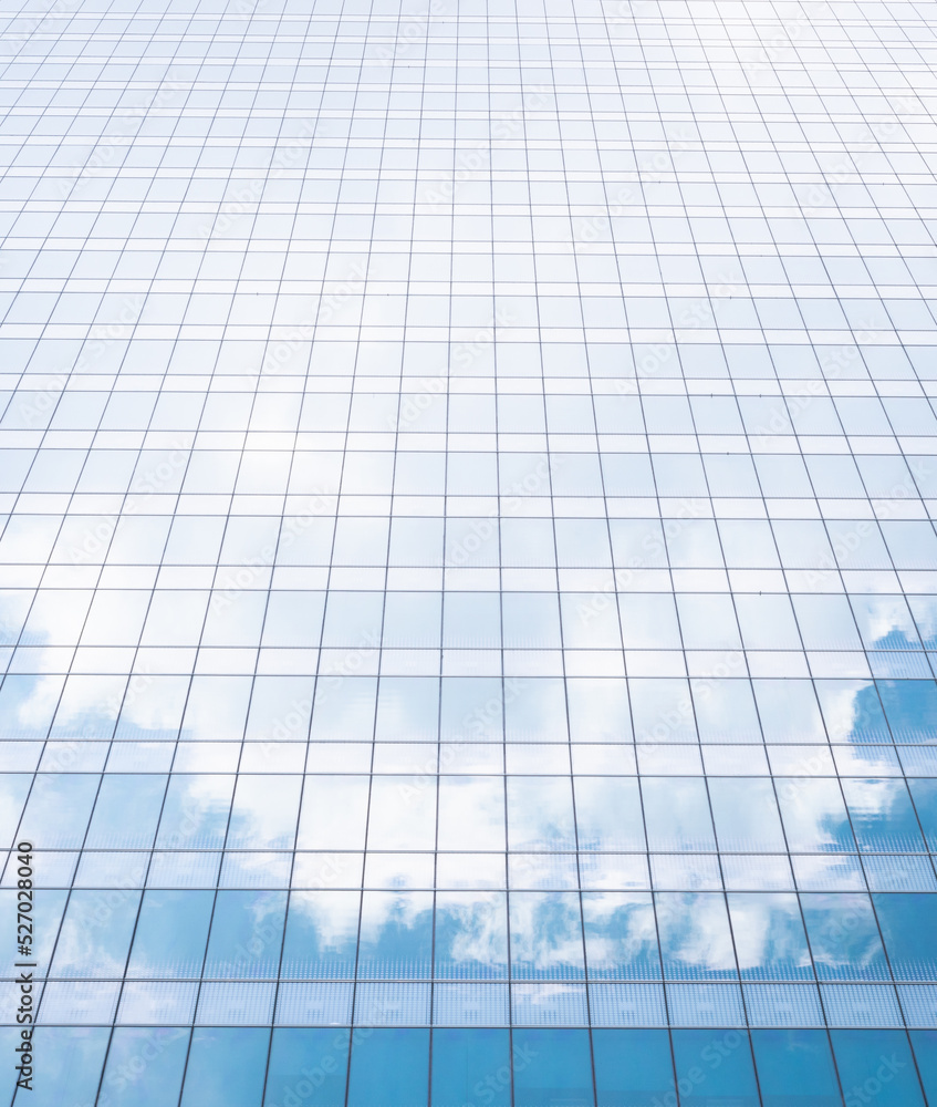 Glass wall architecture building reflection cloud and sky background.concept for modern office Glass wall architecture building reflection cloud and sky background.concept for modern office