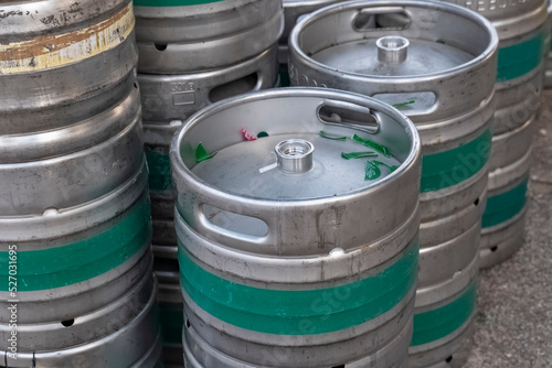 metal beer barrels with beer. Tin containers for storing alcoholic beverages for bars and restaurants. Methods of liquid storage.