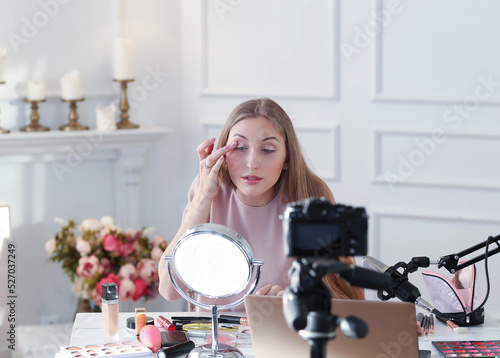 Beauty Influencer at Work: Makeup Blogger Creating a Glamorous Look for Her Audience