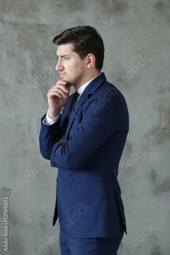 This sleek and professional stock photo collection captures the power and authority of businessmen as they don playful and creative costumes against neutral gray backgrounds, providing a fresh and fun