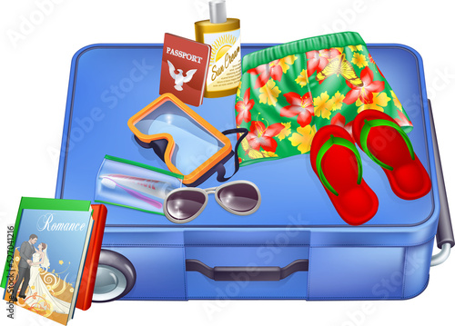 Suitcase and vacation items