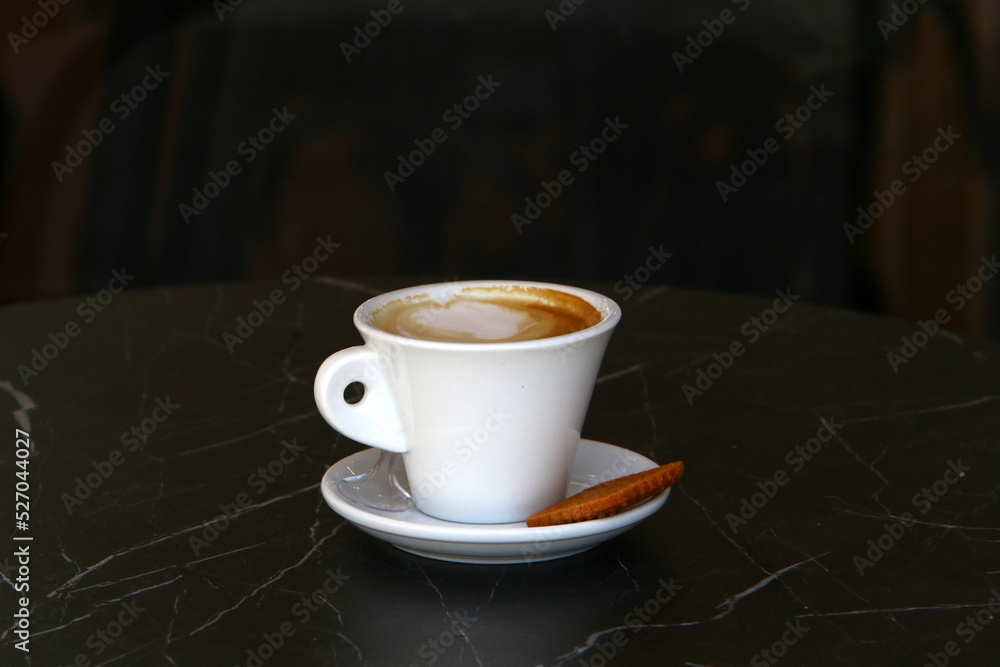 Fototapeta premium Hot coffee on the table in a restaurant.