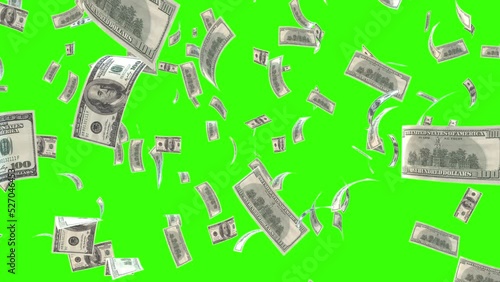 dollars bills falling down in 3D animation video on green screen ready to chroma key photo