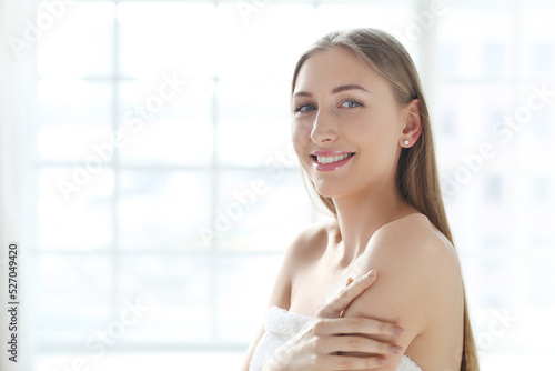 Free Download This captivating stock photo captures the beauty and creativity of a blonde model as she strikes playful and whimsical poses, putting her hands in various forms while capturing the perfect shot - GFXLoad
