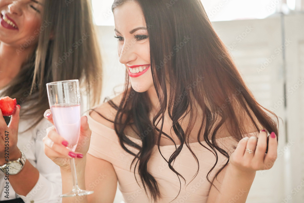 Cheers to Friendship: Girls Night In with Wine Glasses Raised High Cheers to Friendship: Girls Night In with Wine Glasses Raised High