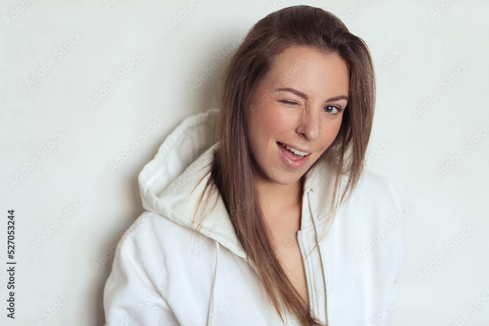 Effortlessly Beautiful: Lovely Girl Strikes a Pose on a Grey Background, Exuding Confidence and Radiance Effortlessly Beautiful: Lovely Girl Strikes a Pose on a Grey Background, Exuding Confidence and Radiance
