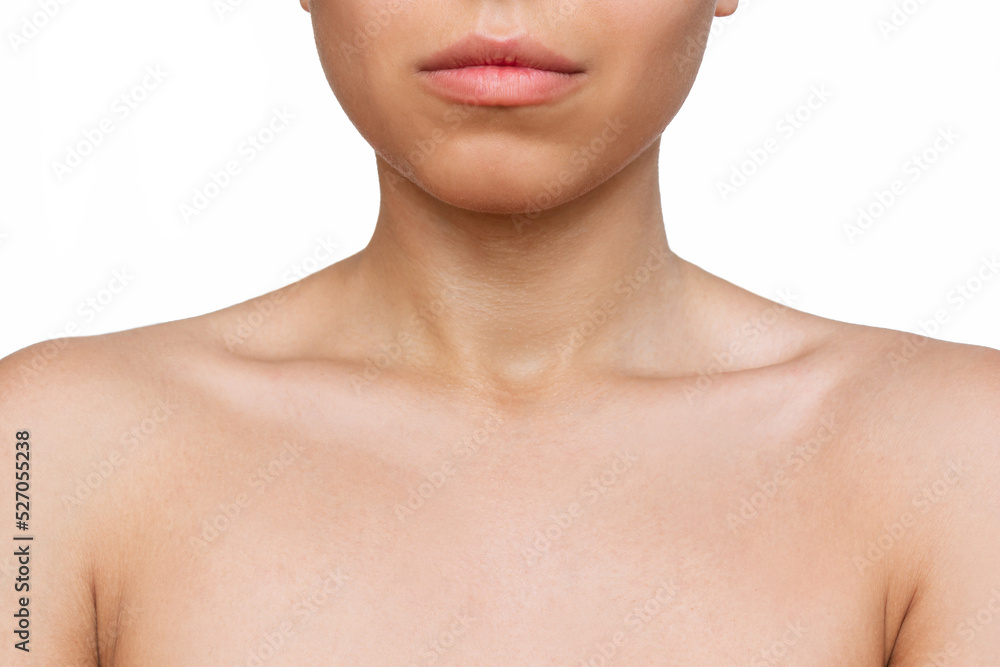 Cropped shot of a young woman with tender collarbone isolated on a white background. Body care, cosmetology. Soft delicate skin Cropped shot of a young woman with tender collarbone isolated on a white background. Body care, cosmetology. Soft delicate skin
