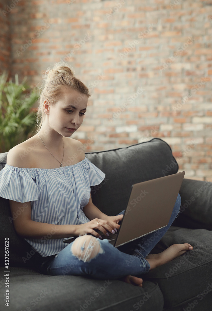 Woman working at home on her laptop Woman working at home on her laptop
