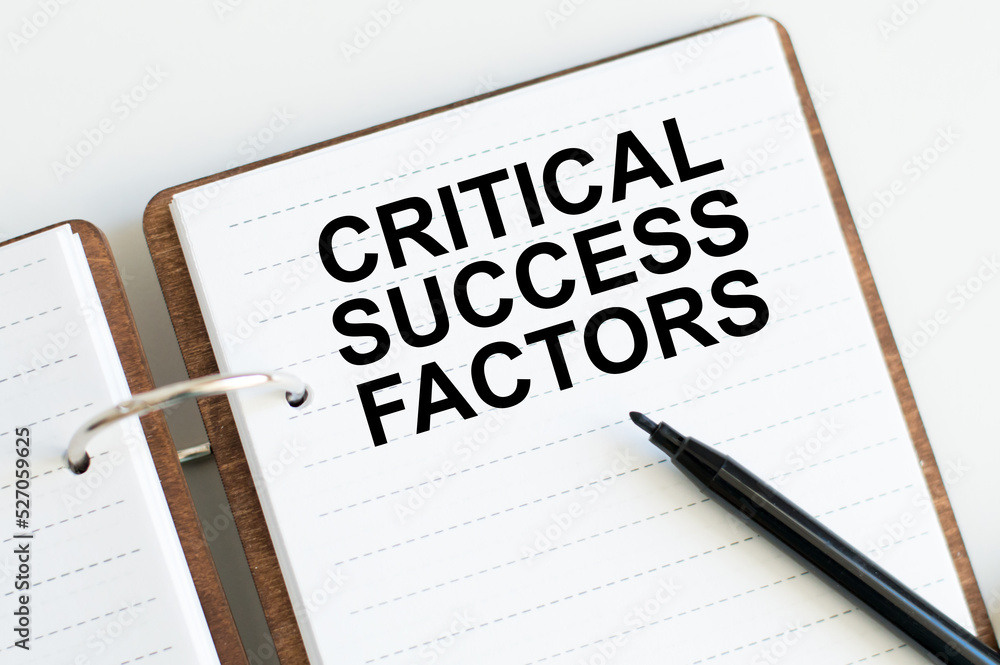 Notepad with the text CRITICAL SUCCESS FACTORS. Business concept. Notepad with the text CRITICAL SUCCESS FACTORS. Business concept.