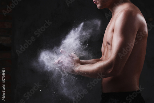 Sculpted to Perfection: Male Model Showcases His Fit Physique in a Studio Photoshoot
