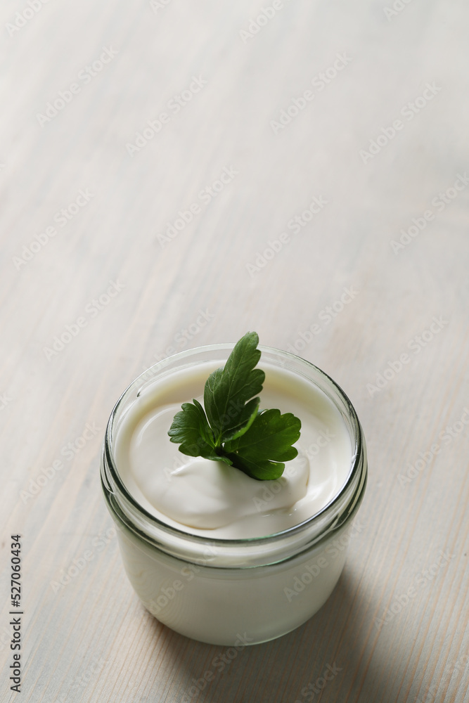 A bowl of yogurt sitting on top of a wooden table, mayonnaise, yogurt, best mayonnaise A bowl of yogurt sitting on top of a wooden table, mayonnaise, yogurt, best mayonnaise