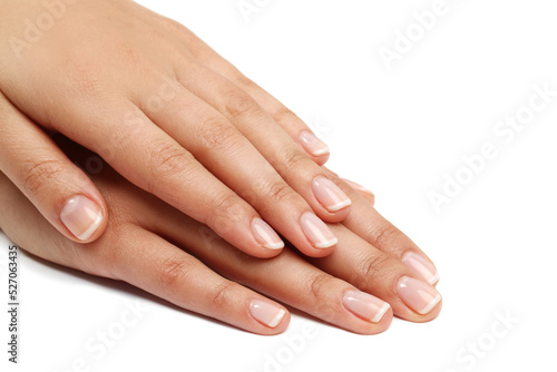 Beautiful woman hands with manicure isolated on white background.