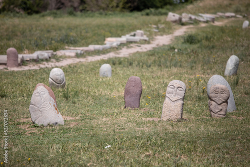 Ancient grave markers carved by Nestorian Christians near Burana Tower in Kyrgyzstan photo