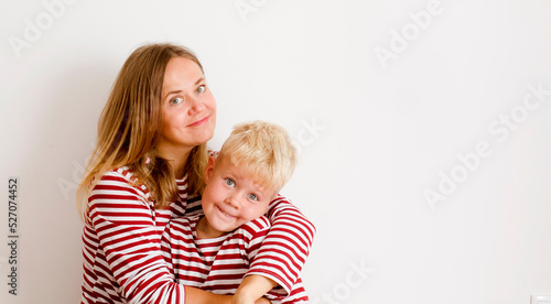 Portrait of happy mother and son over white background , Mother’s Day background