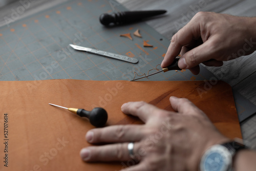 Leather working by hand