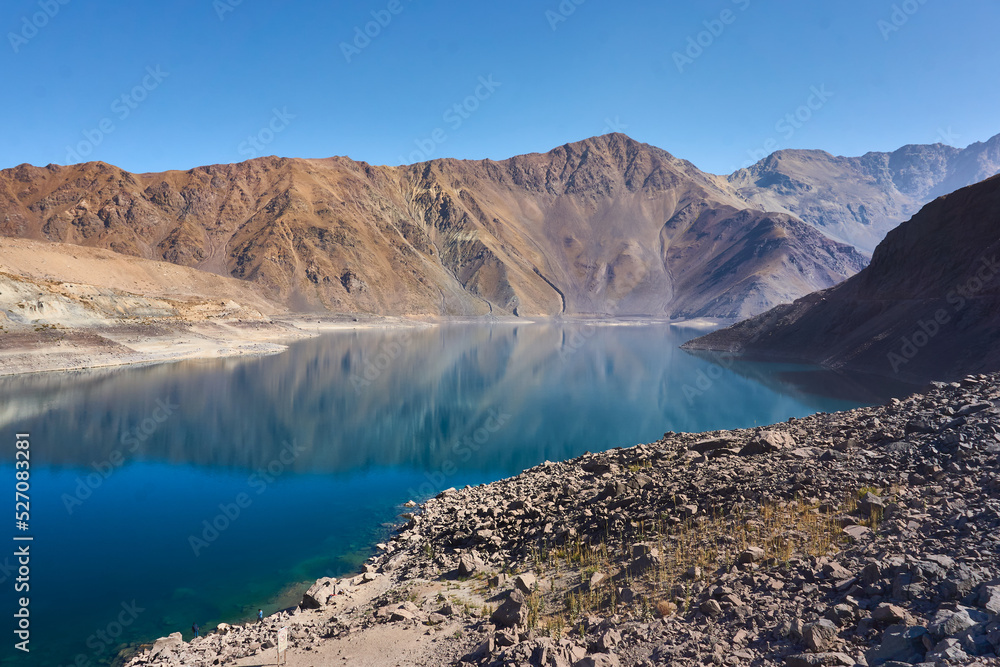 lake and mountains in cajon del maipo in chile